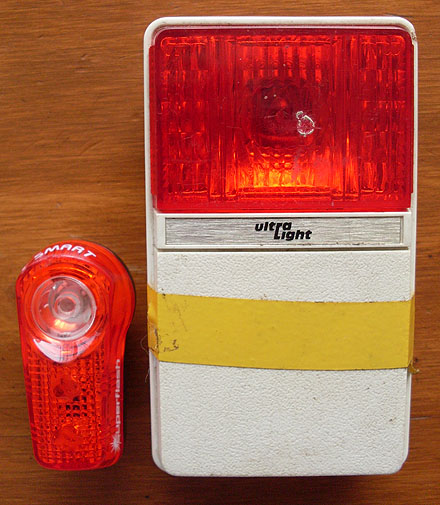 1003-blinky-v-ultra-01 Current day Super Flash tail light beside a old Ultra Light tail light