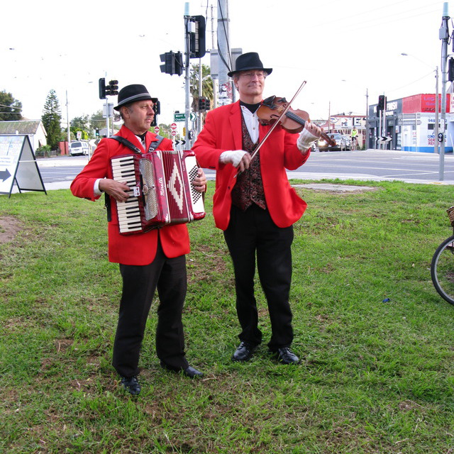 Two musicians entertain at the Darebin breakfast